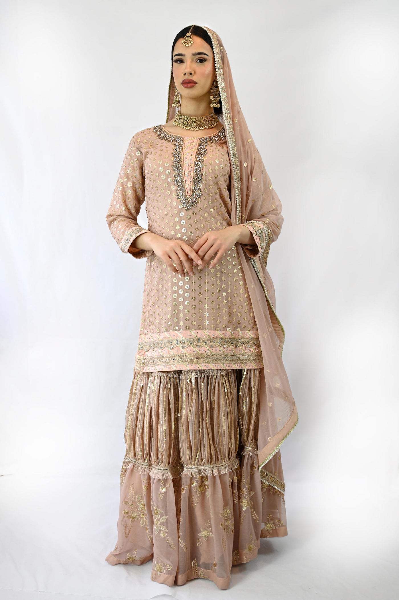 lehenga-suit-in-pink-ruffle-style-skirt